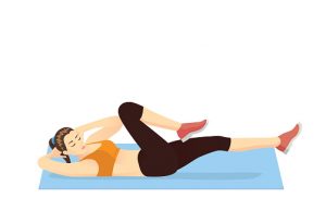Woman doing abdominal workout with Bicycle crunch on blue exercise mat.